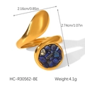 Detail view of gold open ring with blue natural stone inlay and artistic streamline design - Blue (Lapis Lazuli Texture)