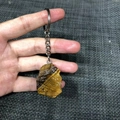 Tiger eye raw stone keychain with natural brown banded texture and silver ring - Tiger's Eye