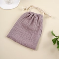 Detail of dark purple muslin cotton drawstring bag with textured fabric and cream rope - Purple