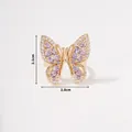 Detailed view of butterfly ring dimensions showing gold plating and purple cubic zirconia - Gold Butterfly Purple White Zirconia