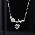 Silver rose pendant necklace with white cubic zirconia and hidden projection stone - 9064 Silver Rose Projection