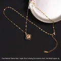 Rotating gold clover necklace in titanium steel with multicolored zircon inlay stones - Hollow Clover Multi-color Zirconia (A700)