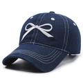 Navy blue denim baseball cap featuring white embroidered bow and vintage washed texture - Adjustable / Navy Blue