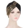 Detailed close-up of shiny gold sequins stitched onto a premium black turban hat for women - Black