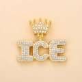 Close-up of golden crown ICE pendant with sparkling clear rhinestones on beige background - Gold ICE (Crown)