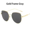 Occhiali da sole cat-eye oversize con montatura in metallo dorato e lenti grigie - Montatura Oro Lente Grigia