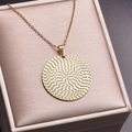 Close-up of 18k gold plated round pendant with woven texture in a beige jewelry box - Gold Color (Necklace Set)