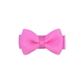 Close-up of a pink solid color candy bow hair clip for girls with ribbed texture - Coral Pink