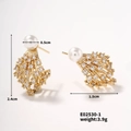 Detail view of gold pearl earrings with zirconia settings showing 2.4cm height and dimensions - Teardrop Style (E02530-1)