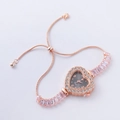 Detail of heart-shaped rose gold watch with pink stones and adjustable slide clasp - Rose Gold-Heart Pink Gem (Gedi)