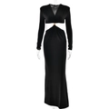 Detail view of deep V-neck black maxi dress with waist cut-outs and golden ring decoration - S / Black