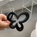 Matte black butterfly claw clip for hair with minimalist floral design for women - Matte Black