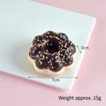 Realistic 7cm chocolate donut model with sprinkles on a white plate and pink background - Diameter 7cm, Height 3cm / Coffee