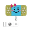 Detail of retractable badge holder with glittery band-aid design and smiling blue center - Band-aid