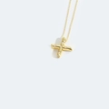 Golden necklace with letter X cross pendant featuring white pearl inlays on a thin chain - Letter X