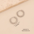 Sleek silver stainless steel hoop earrings 1cm diameter displayed on a stone surface - Inner Diameter 1.0cm / Silver (10mm)