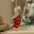 Christmas stocking resin ornament with red base, yellow bow, and white polka dots - Red Christmas Sock Style