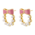 Eleganti orecchini a perno con fiocco rosa e perle su sfondo bianco in finitura oro - Rosa (1 Paio)