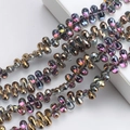 Detailed view of iridescent teardrop glass beads with metallic purple and pink finish - 100 Pcs/Pack / Half Gold Inner Multicolor
