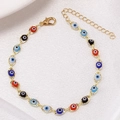 Detail of colorful evil eye anklet with golden chain, lobster clasp and extension link - Gold Base Mixed Color