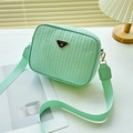 Mint green woven crossbody camera bag with adjustable strap and Luck For You plaque - Light Green