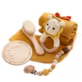 Newborn baby gift set featuring crochet lion rattle, wooden hairbrush and pacifier chain - Lion Rattle Set / Yellow