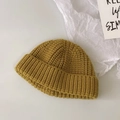 Detalle del tejido de punto del gorro de invierno amarillo jengibre para niños - Talla Única Niño / Amarillo Mostaza