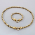 Conjunto de joyas de calavera de acero inoxidable dorado con collar y pulsera - Dorado
