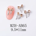 Détail macro de breloques nœud papillon pour ongles avec diamant cœur et strass - Nœud Champagne Base Argentée (AB65)