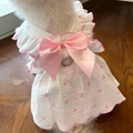 Detail of dog dress with pink heart patterns and large satin bow on wooden floor - XS (Bust 30cm) / Pink Heart Dress