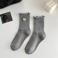 Grey knit crew socks with ruffled edges and white bow accents for a sweet style - Medium Grey