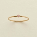 Golden S925 sterling silver ring featuring a round pink gemstone solitaire setting - US 7 / October/Pink Zirconia
