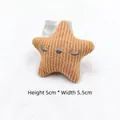 Detail of camel star plush accessory with cute face embroidery, size H 5cm x W 5.5cm - Khaki Star (Without Pin)