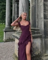 Detail view of deep purple long dress with ruffle edges and elegant high leg slit detail - S / Burgundy