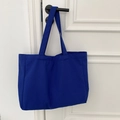 Detail shot of Klein blue canvas tote bag showing high-quality fabric texture and weave - Solid Royal Blue