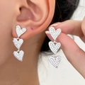 Elegant silver triple heart drop earrings with shimmering white crystals in a refined style - Silver Pave (5099)
