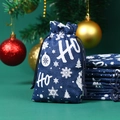 Blue linen Christmas drawstring gift bag featuring white snowflake and tree patterns - 10*14cm / Blue Base Santa Snowflake
