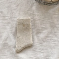 Speckled cream knit mid-calf socks with ribbed texture and decorative side button detail - One Size / Off-white