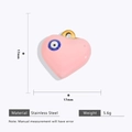 Macro view of 17mm pink heart pendant with evil eye in gold plated stainless steel - Pink Evil Eye Heart