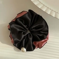 Elegant black and pink satin scrunchie with a single pearl accent for ponytail styling - Beige and Black