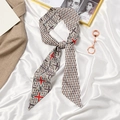 French bow hair ribbon in beige and red geometric pattern with luxury silk texture - Pink Brown Geometric Block