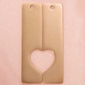 Close-up of two rose gold rectangular tags with heart-shaped cutout on pink fabric - Rose Gold (One Set)