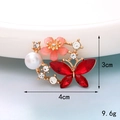 Red crystal butterfly brooch with pink flower, white pearl, and small rhinestones - D931 Pearl Butterfly