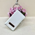 Minimalist long white textured leather wallet with rectangular metal plate on display - White