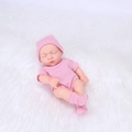 Mini 20cm reborn baby doll wearing a pink striped outfit in a sleeping pose - Pink Striped Style