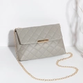 Light grey quilted crossbody bag with gold rectangular metal buckle and chain strap - Gray