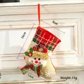 Hanging beige linen Christmas stocking with snowman decor and red green plaid trim - Mini Linen Snowman Style