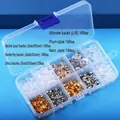 Macro shot of 10-compartment storage box filled with assorted silicone and metal earring backs - 10-Grid Mixed Set Approx. 840pcs + Box