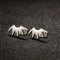 Macro shot of silver fan-shaped stainless steel stud earrings with sunburst ray design - Sun Radiant Style (680) / Steel