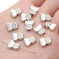 Silver cat-shaped metal beads for DIY jewelry making and handmade necklaces - Cat / 9x11mm